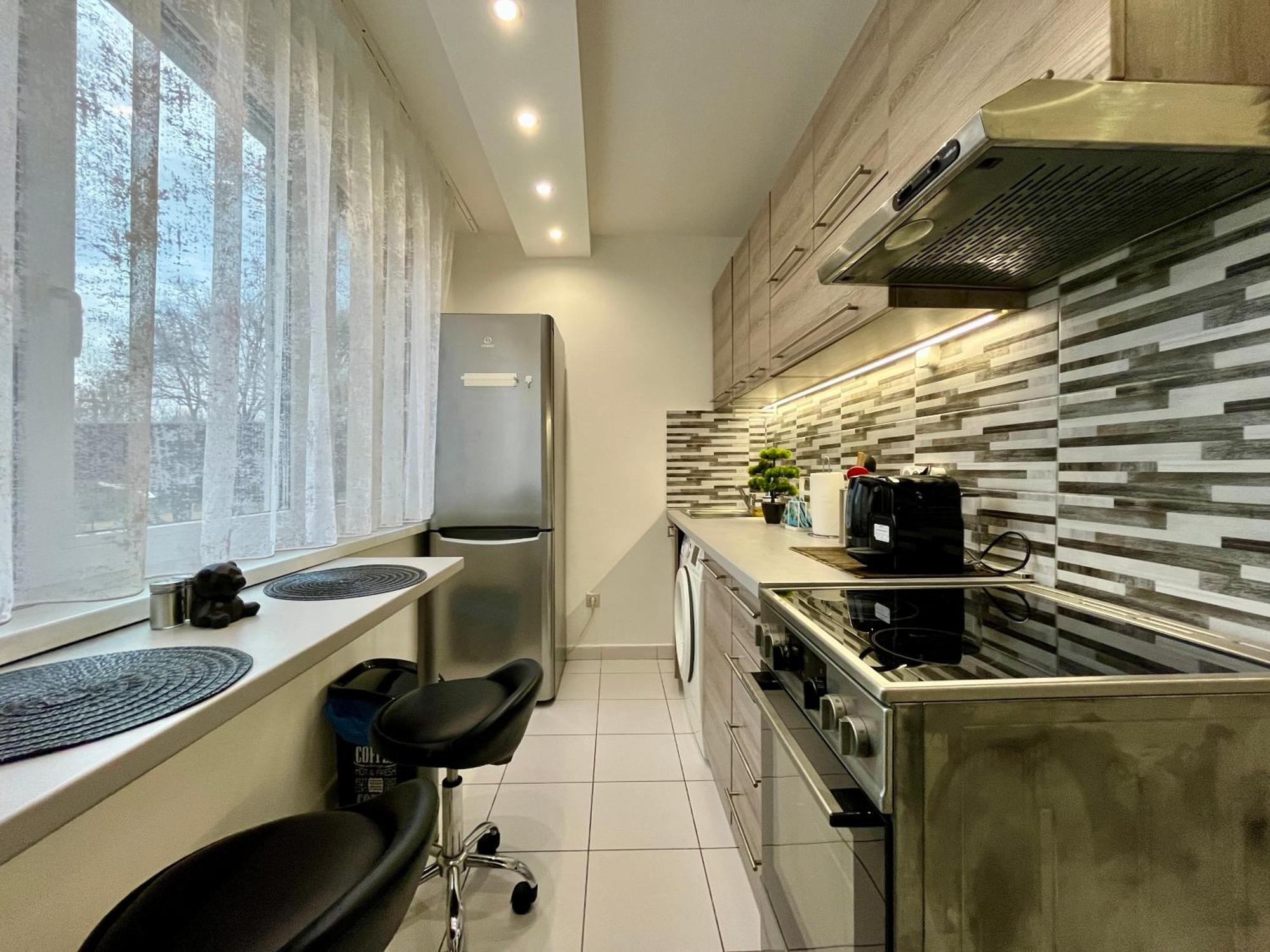 Greatforestsportandspauniversityflat Apartmán